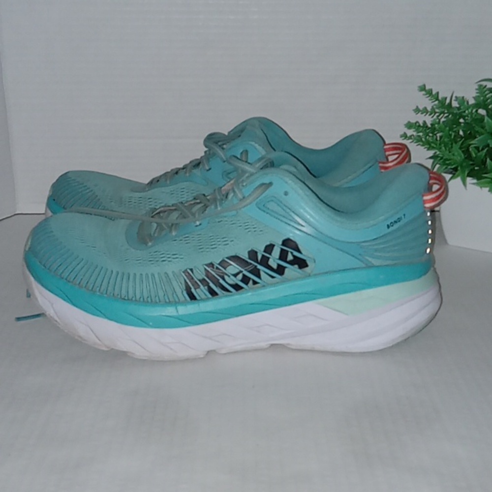 Hoka Bondi 7 Running Shoes. Womens size 10. Teal in color.